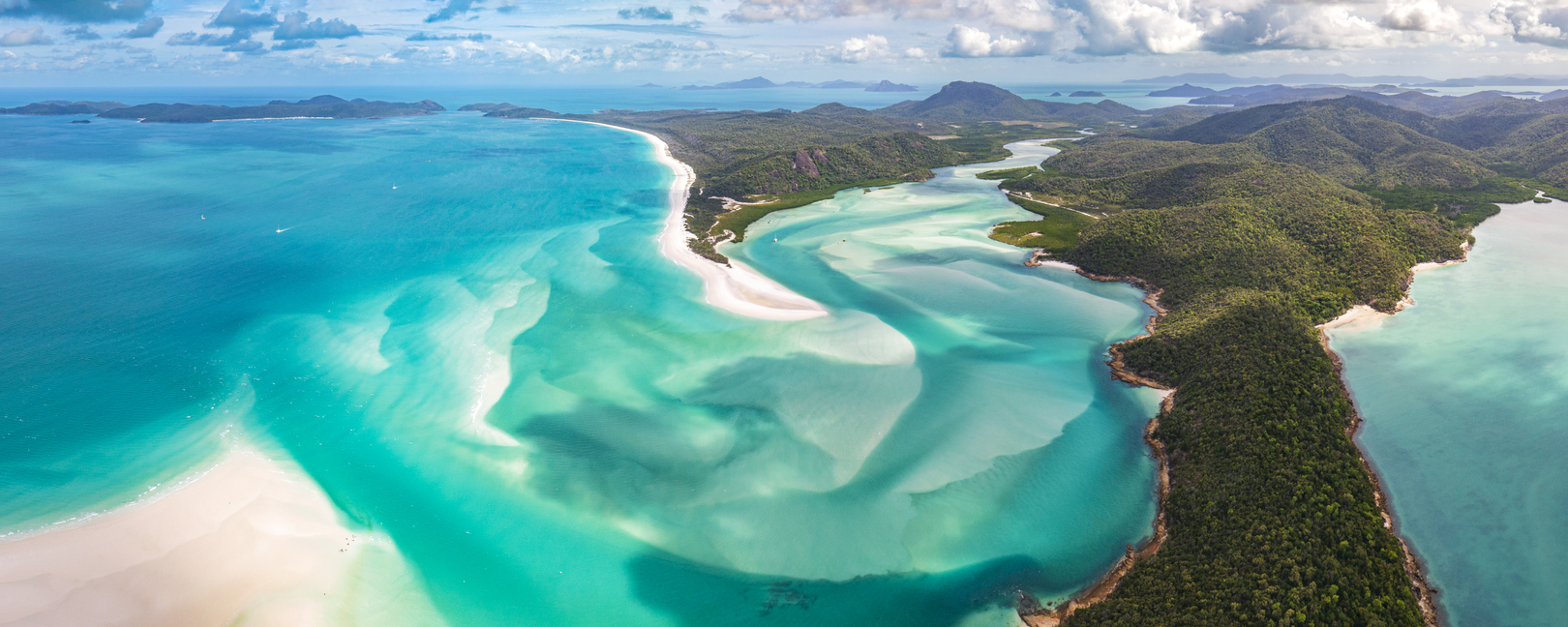 Panorama of Hill Inlet on a sunny day in Whitsundays Island in Great Barrier Reef, Australia